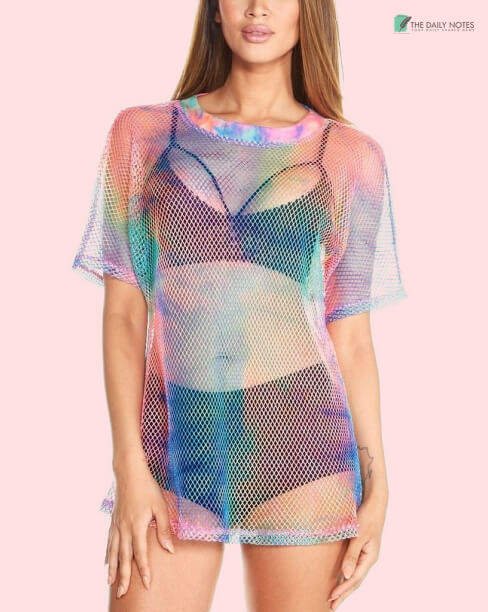 A Sheer Transparent Rainbow Color Shirt On Black Tank Top And Black Hipster Shorts